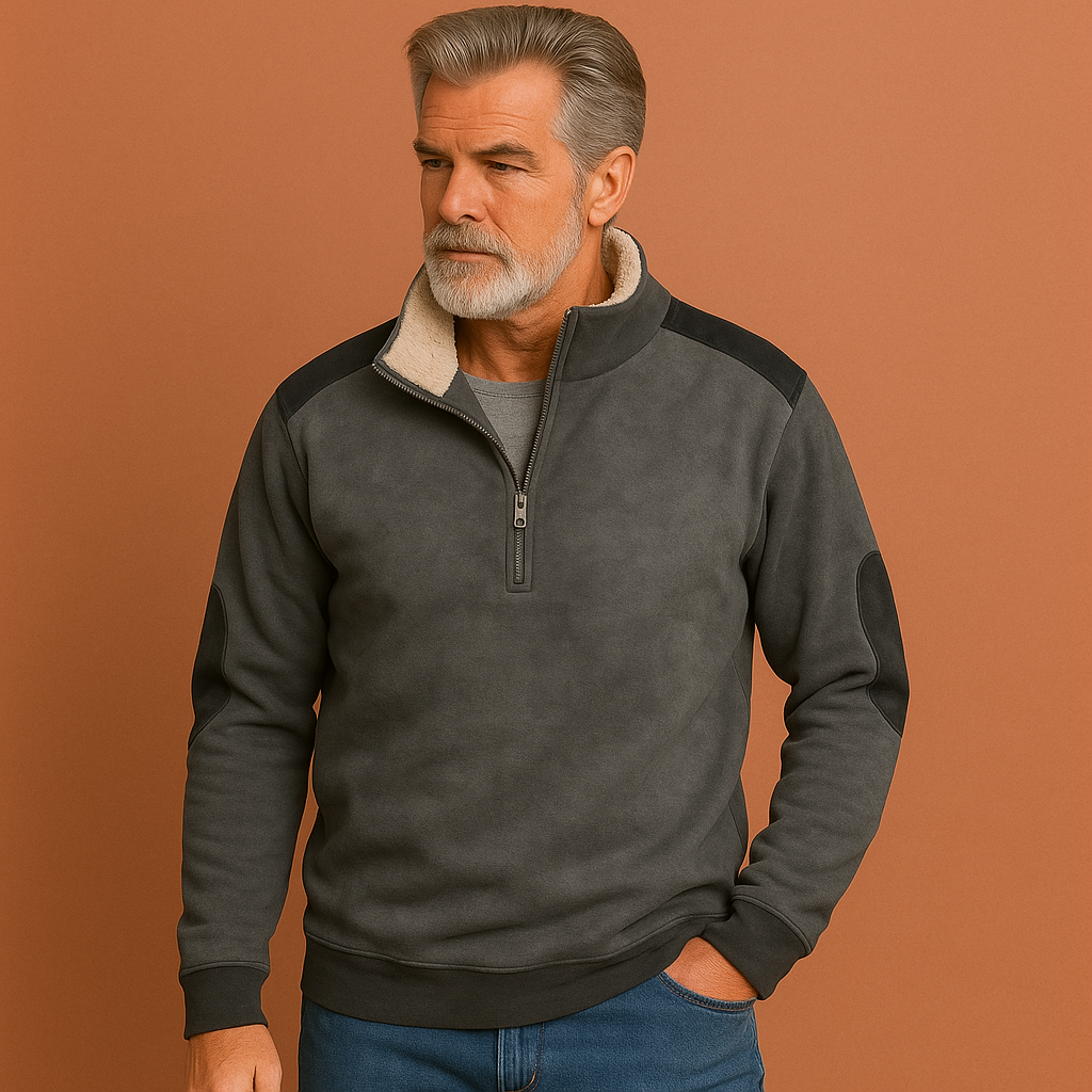 Heren vintage trui in grijs met halve rits en contrasterende details, comfortabel en stijlvol voor casual outfits.