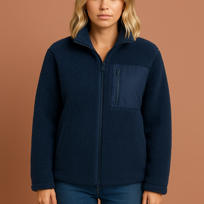 Dames teddy fleece jas in blauw met rits, zacht en comfortabel voor koude herfst- en winterdagen.