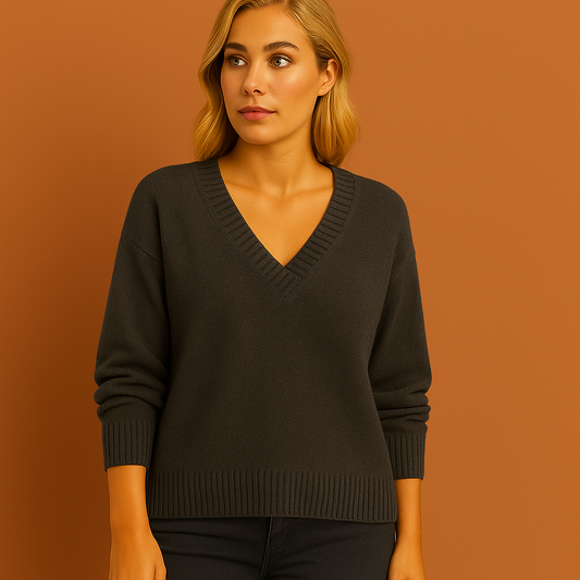 Donkergrijze damestrui met stijlvolle pasvorm en tijdloos ontwerp, ideaal voor casual en chique outfits.