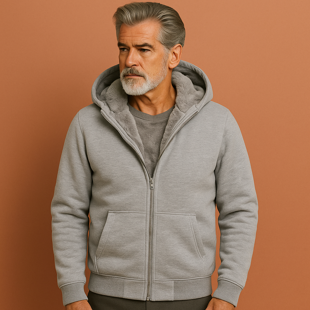 Grijs warm heren wintervest met capuchon en zachte binnenvoering, ideaal voor koude dagen en casual gebruik.