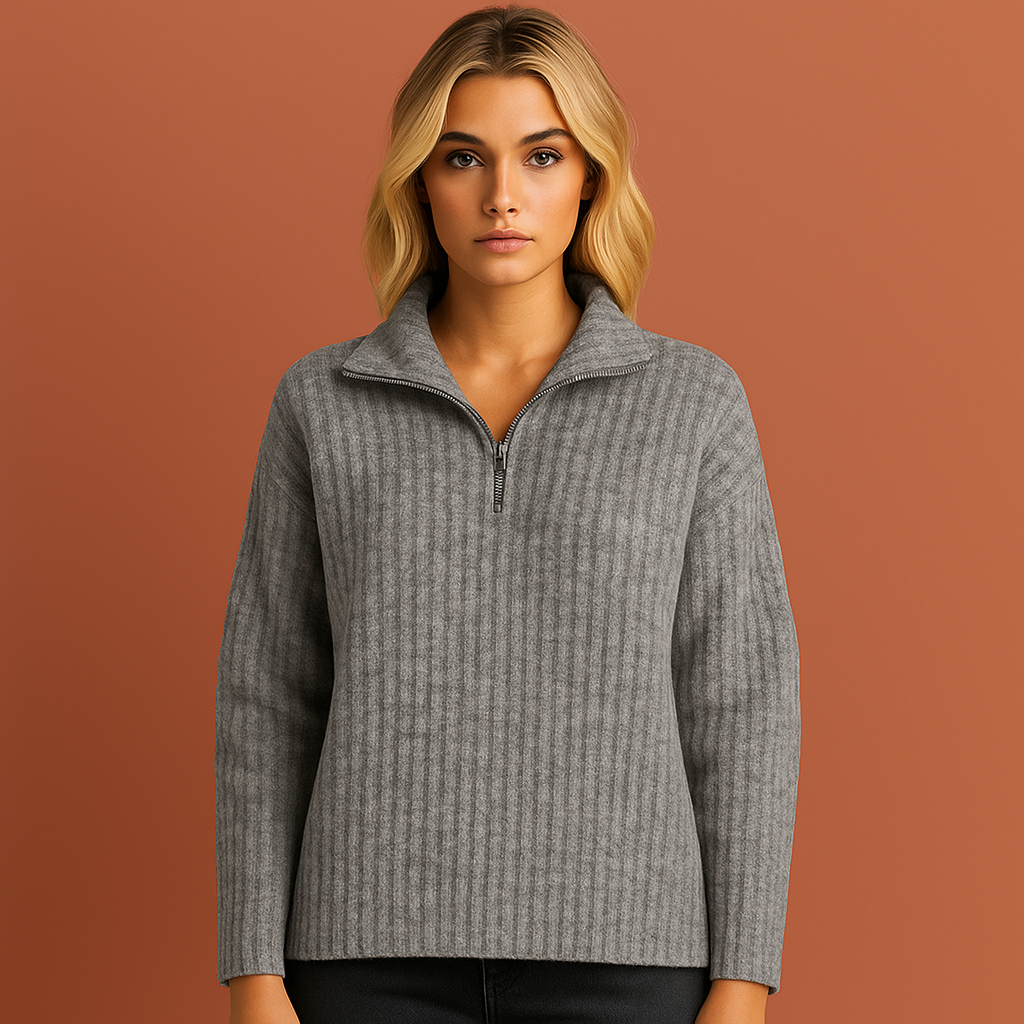 Grijze damestrui met half-zip en hoge kraag, stijlvolle pasvorm perfect voor casual en elegante outfits.