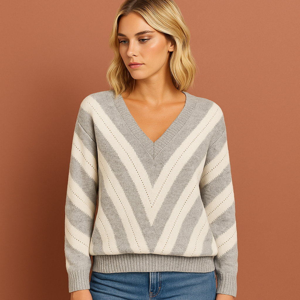 Dames trui in grijs met klassieke pasvorm en zachte textuur, comfortabel voor dagelijks gebruik.