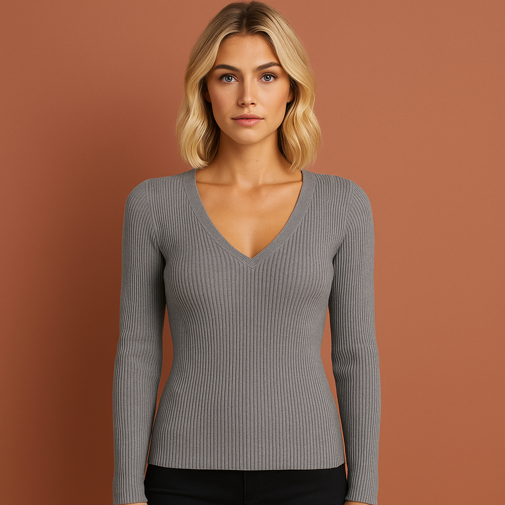 Grijze stijlvolle herfsttrui voor dames met moderne pasvorm, perfect voor casual of elegante outfits in het najaar.