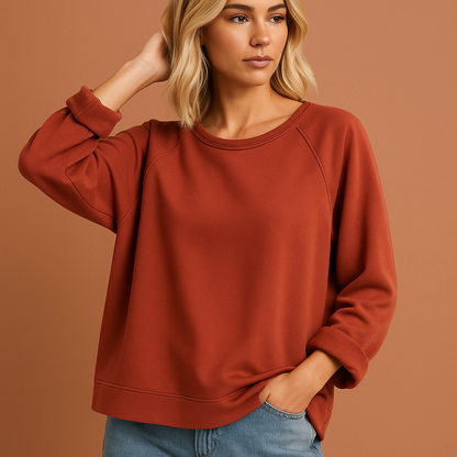 Oranje oversized sweater voor dames met moderne uitstraling, perfect voor casual outfits en ontspannen dagen.