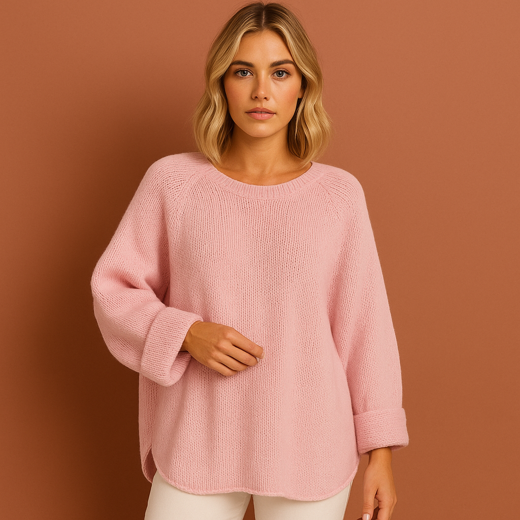 Dames oversized trui in roze met losse pasvorm, zacht en comfortabel voor casual en stijlvolle outfits.
