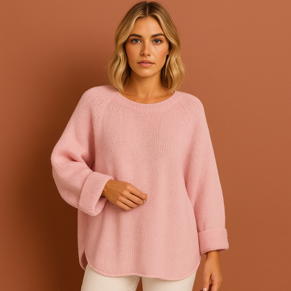 Dames oversized trui in roze met losse pasvorm, zacht en comfortabel voor casual en stijlvolle outfits.