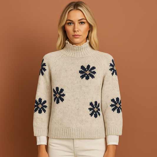 Dames gebreide trui in wit met zwarte bloemen, zacht en comfortabel voor elegante en winterse looks.