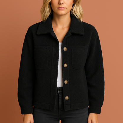 Dames teddy jas in zwart met ritssluiting, zacht en comfortabel voor casual en stijlvolle outfits.