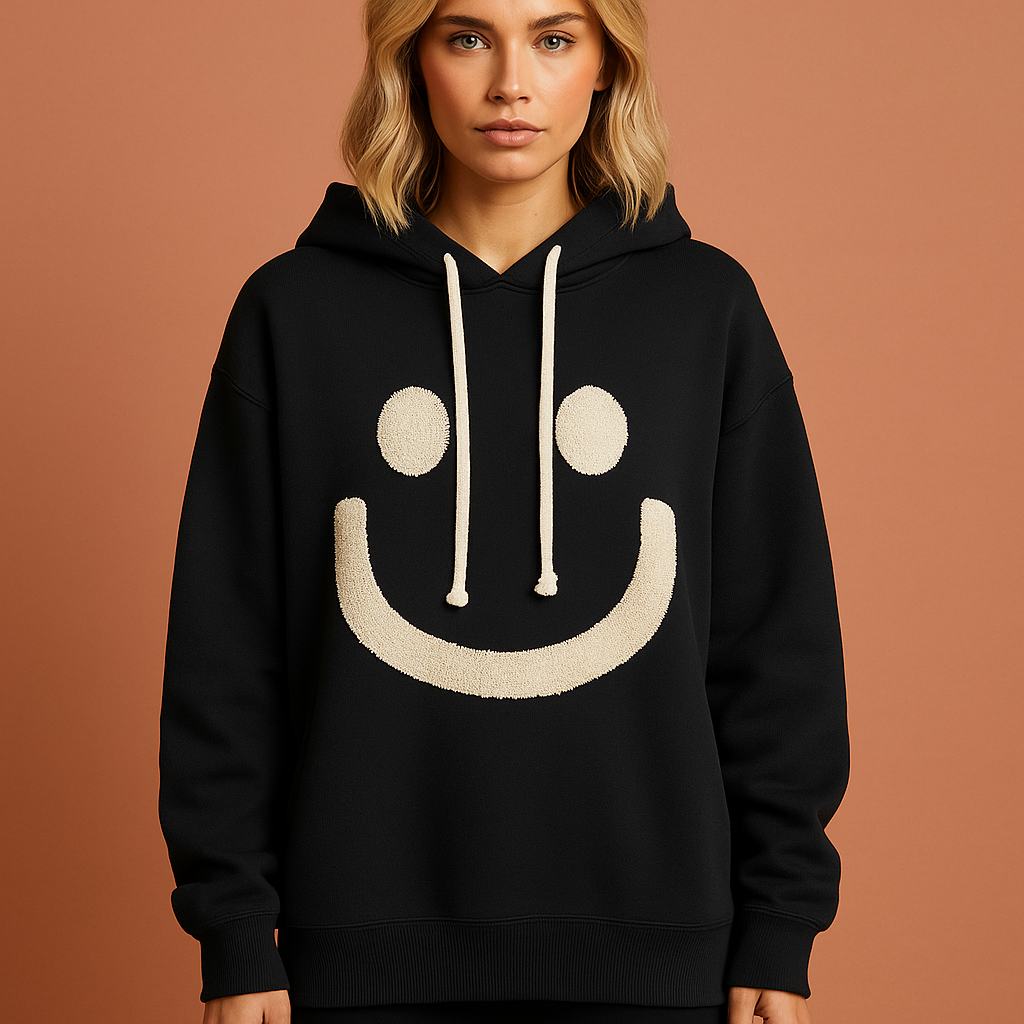 Warme hoodie met smiley voor dames in zwart met relaxed design en comfortabele pasvorm voor casual outfits.